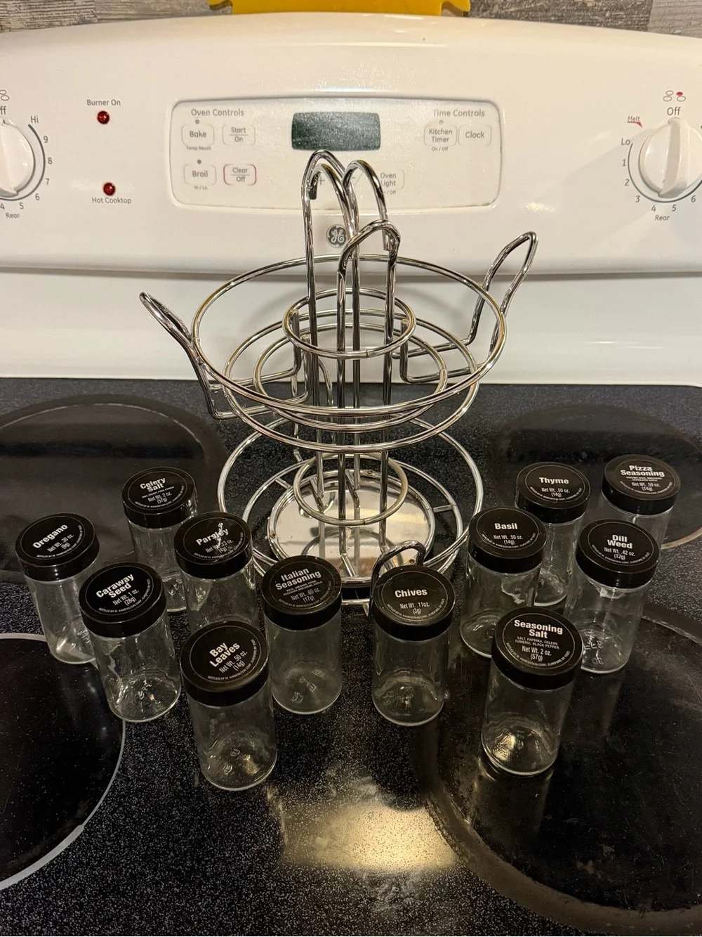 Chrome Rotating Spice Rack with Black-Lid Glass Jars - Home Kitchen
